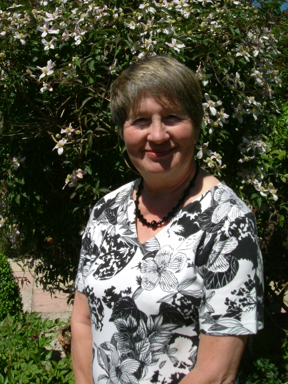 Margaret in the garden of her Devon homek